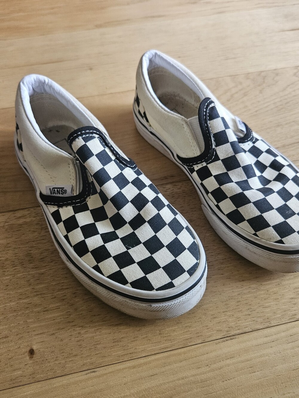 Vans Kids Slip-On Sneakers in Black and White Checkerboard